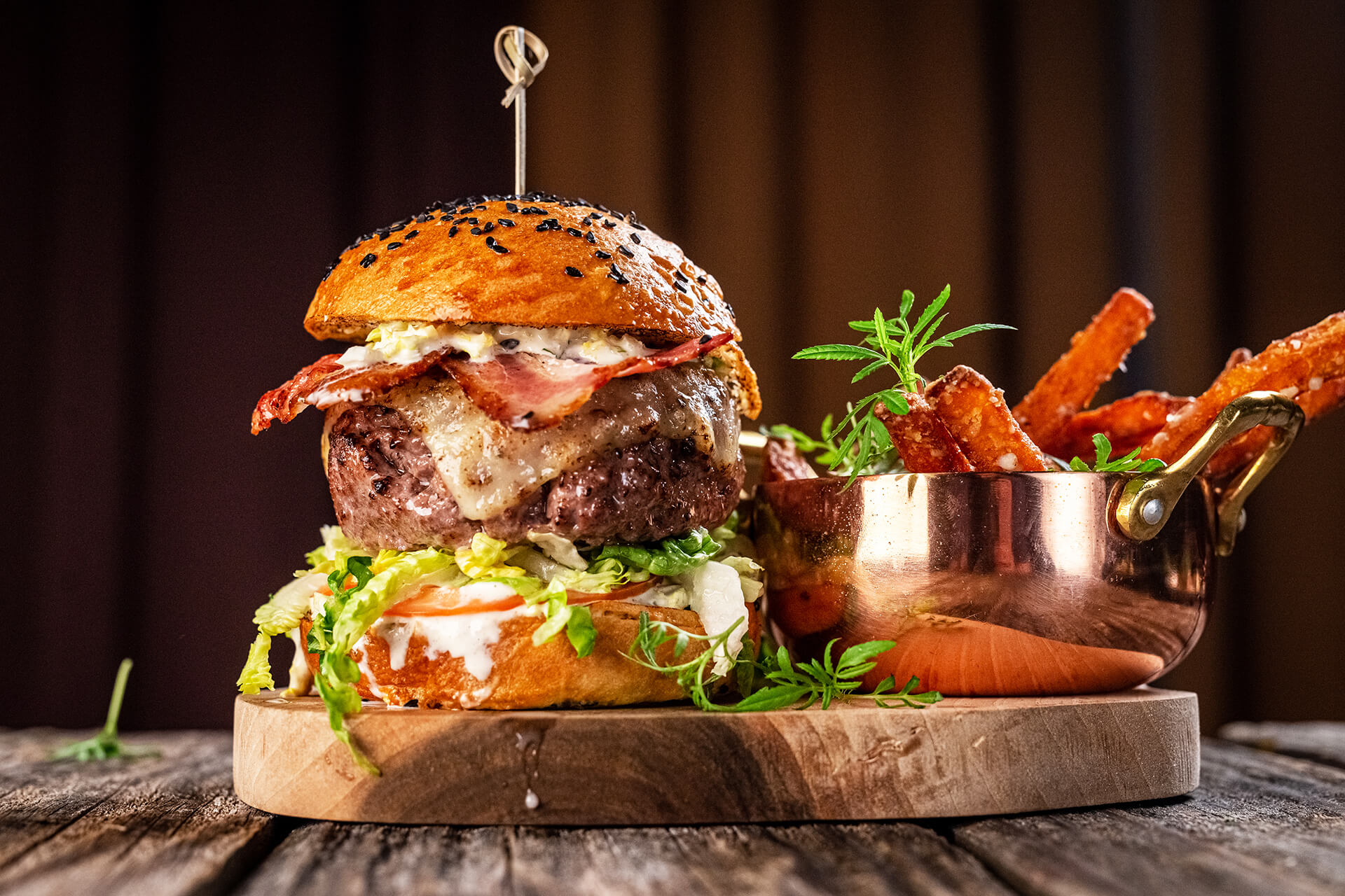 dining image of amazing burger and upscale take on french fries